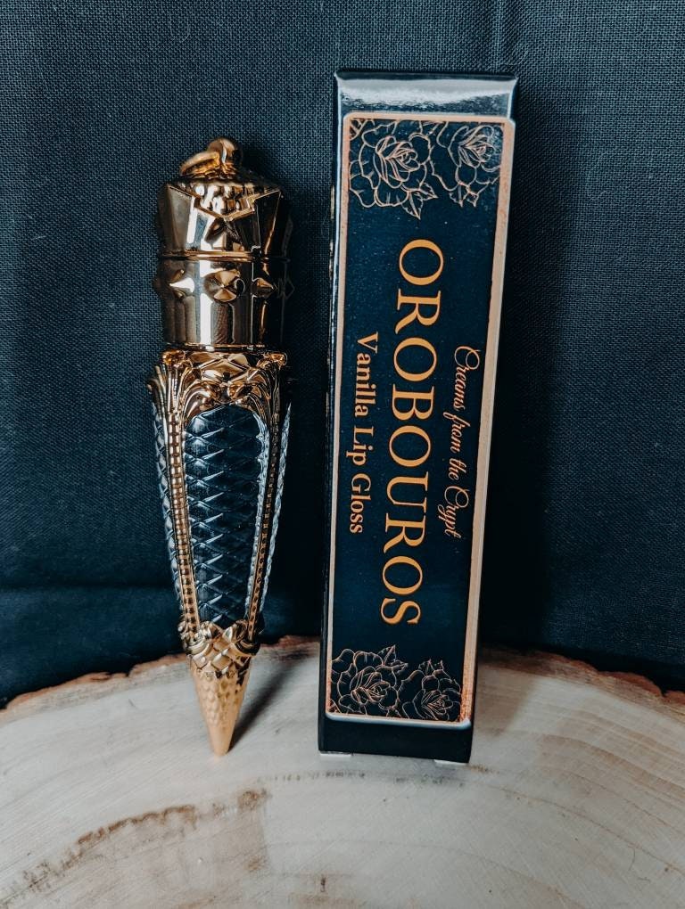OROBOUROS - Black French vanilla flavored lip gloss, scented, dark pigment, gothic cosmetics, gold, luxury lip color, vegan makeup, tinted